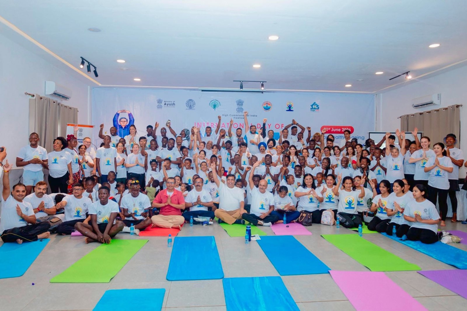 Over 150 yoga enthusiasts came together in Freetown to celebrate the 12th International Day of Yoga, embracing this year's theme,
