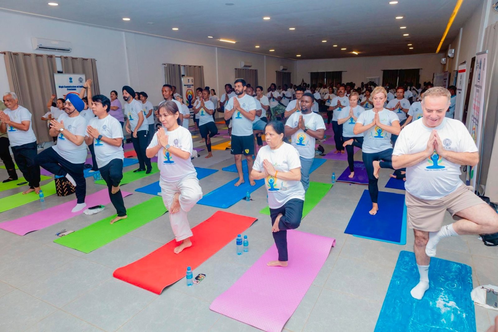 Over 150 yoga enthusiasts came together in Freetown to celebrate the 12th International Day of Yoga, embracing this year's theme,