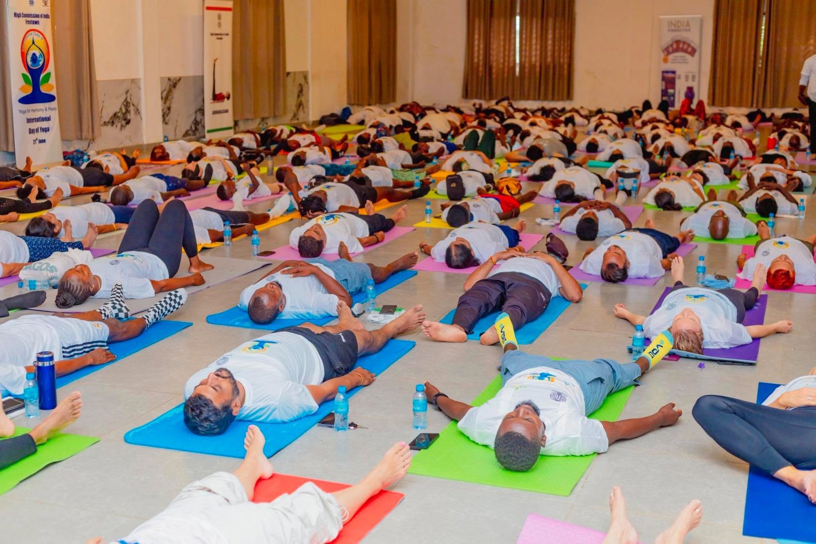 Over 150 yoga enthusiasts came together in Freetown to celebrate the 12th International Day of Yoga, embracing this year's theme,