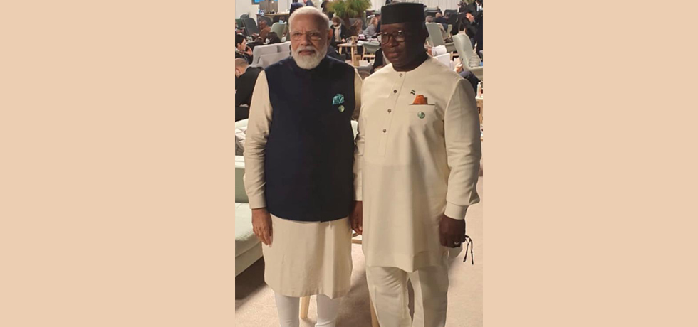 H.E. Mr. Narendra Modi, Prime Minister of India, and H.E. Brig. Rtd. Julius Maada Wonie Bio, President of Sierra Leone, at COP26 in Glasgow (1 November 2021)